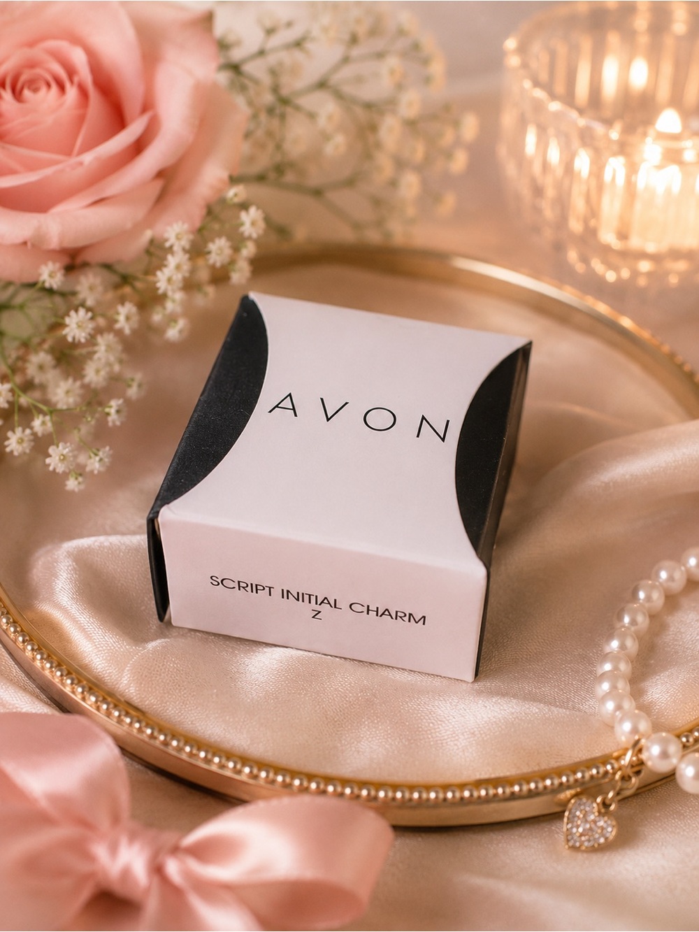 Avon “z” silver charm.